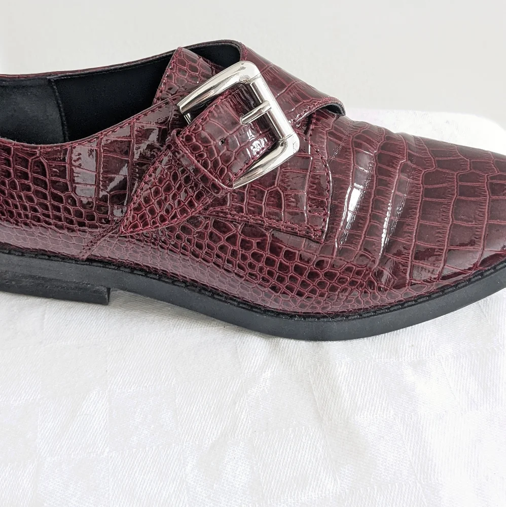 Patent leather loafers by Aldo